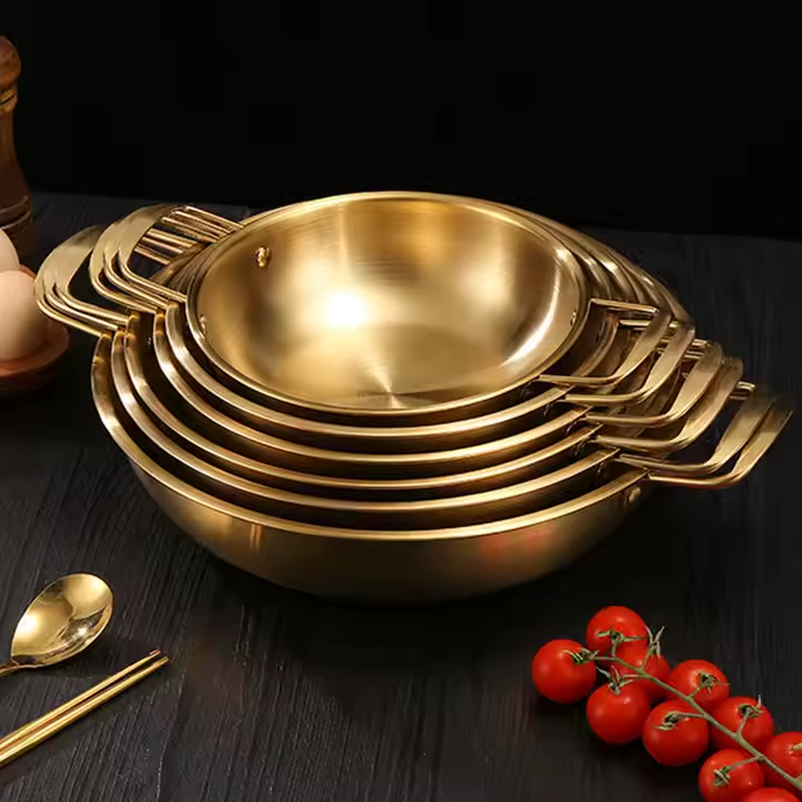 Premium golden cookware and utensils set with lids, ideal for stylish and everyday cooking