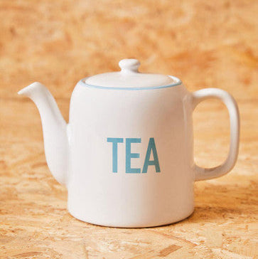 White and Blue Teapot with Blue Tea Script