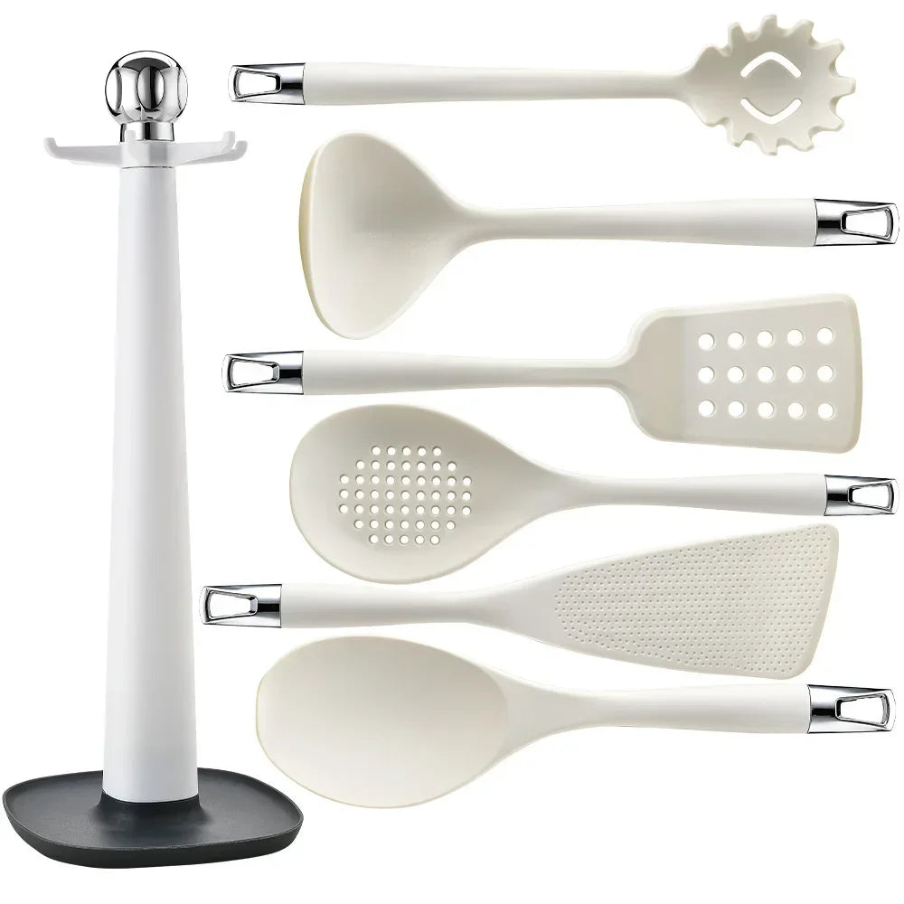 7-Piece Silicone Kitchen Utensils Set with 360° Rotating Countertop Holder – White silicone heads and handles with silver-tone stainless steel hanging hooks/end caps. Heat-Resistant, Dishwasher Safe