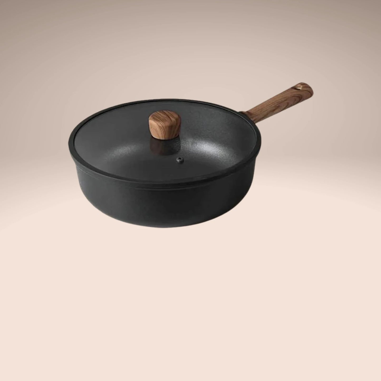 A black deep frying pan with lid and a wooden handle, shown on a light beige background with text reading 'Titanium is healthier' and 'Arctic Series 28 cm Deep Frying pan with lid.'.